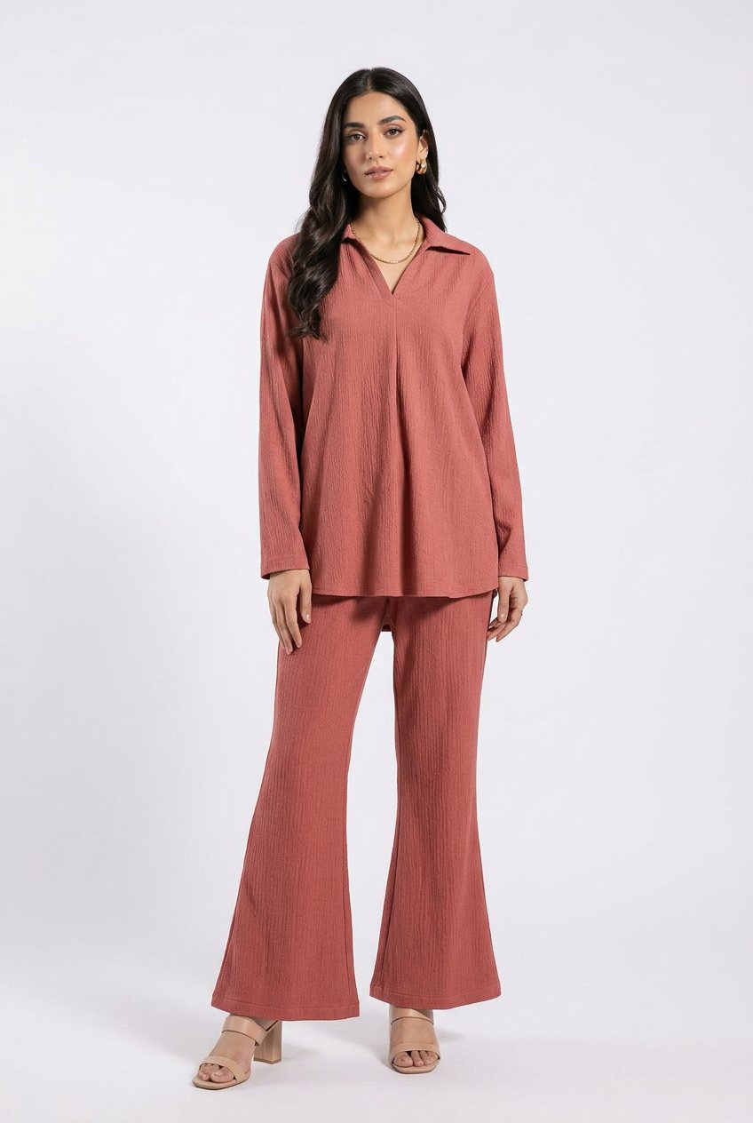Gulnar Rust Pink Flare Trouser Set — Rust Pink Pakistani co-ord set worn by model