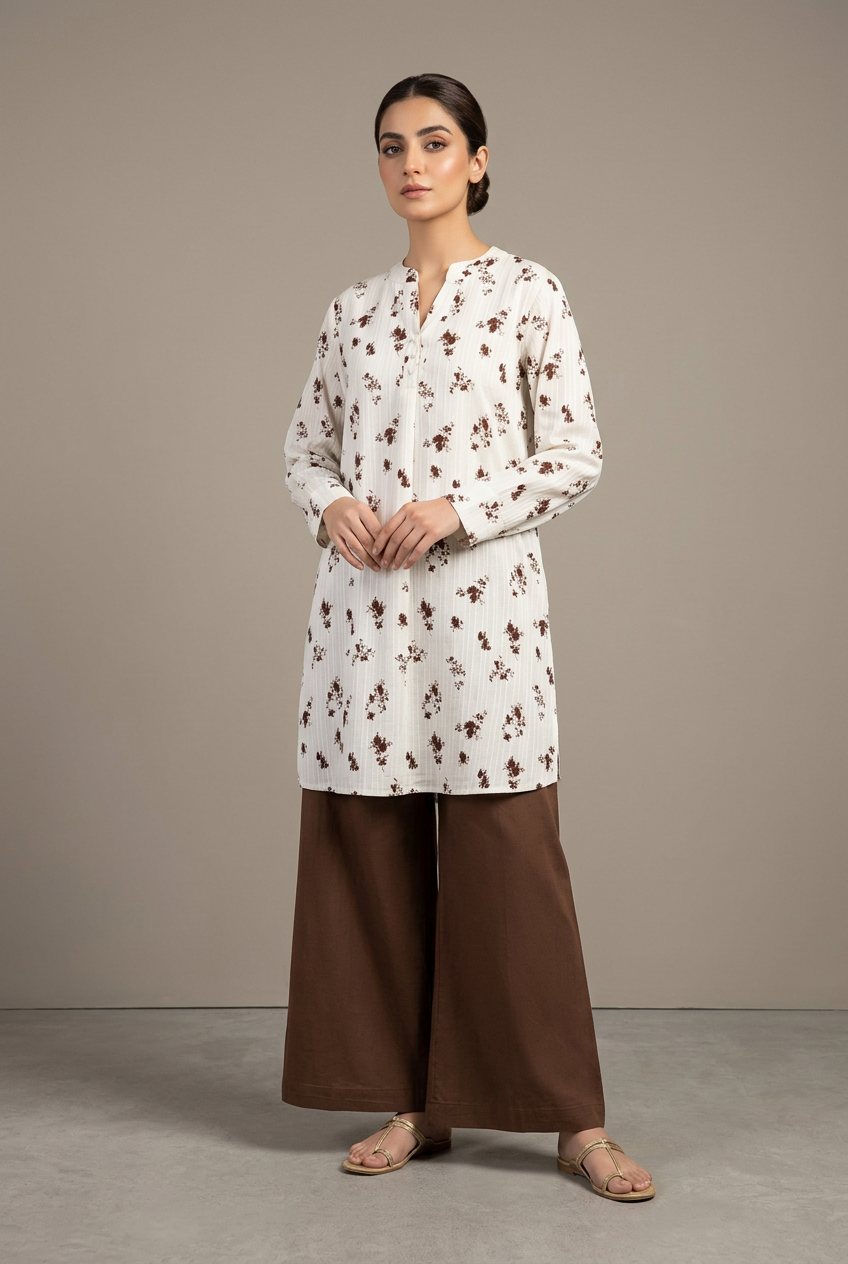 White Floral Kurta with Brown Palazzo Pants — Pakistani outfit worn by model